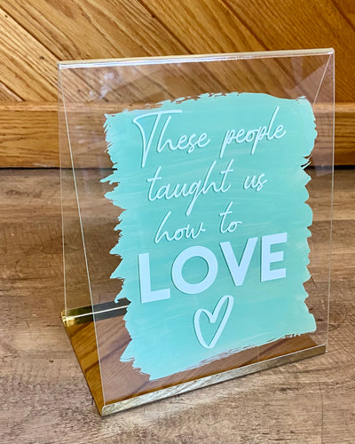 PROS100-C “These people taught us how to love” Sign