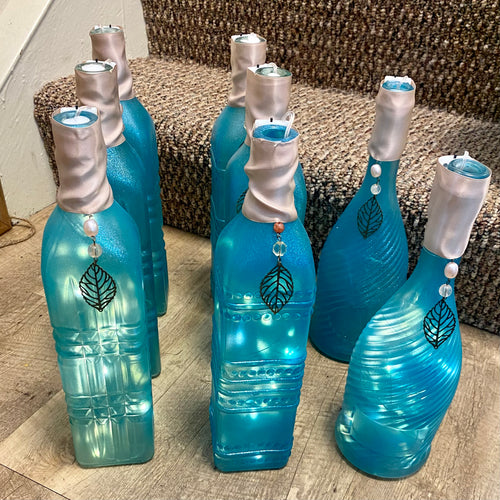 FLAN100-I Turquoise Bottle Centerpieces